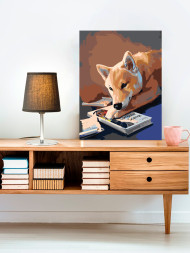 Raqamlar bo'yicha rasm "Kuchuk kitob o'qimoqda"